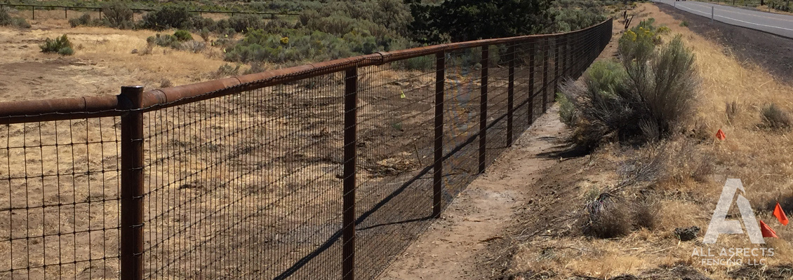 pipe fence with woven wire by All Aspects Fencing